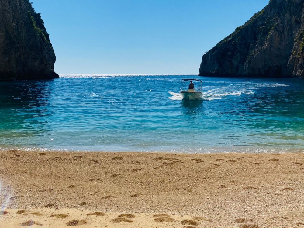 picture from activity Bareboat Charter a 5,5m Motorboat & Chart a Custom Cruise to Shipwreck Beach & the Blue Caves