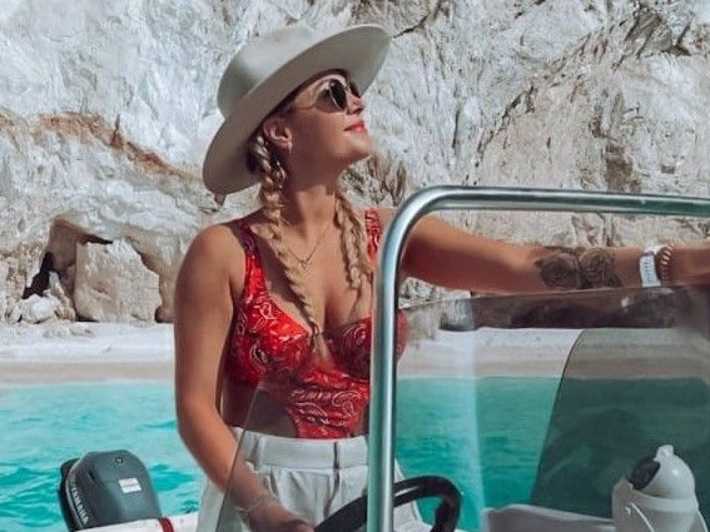 Excursion Bareboat Charter a 5,5m Motorboat & Chart a Custom Cruise to Shipwreck Beach & the Blue Caves